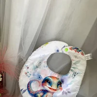 bavoir cameleon face
